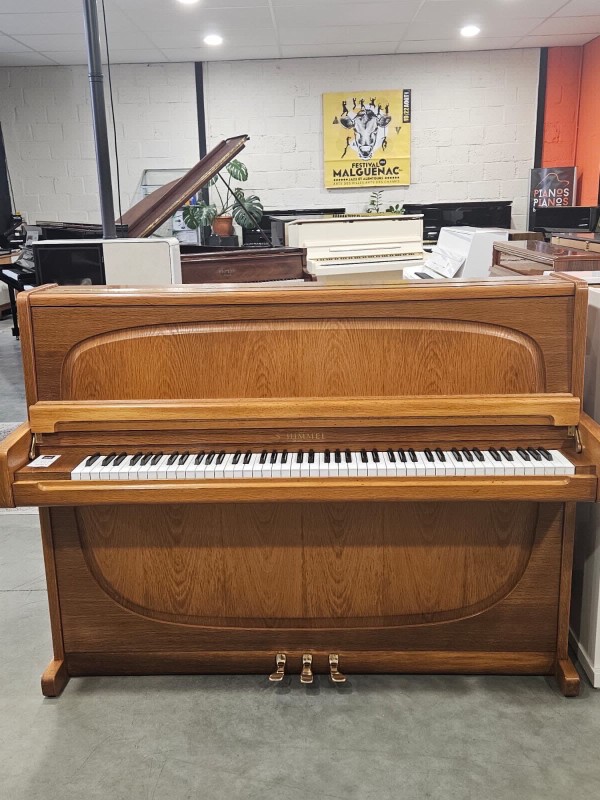 Achete un piano droit SCHIMMEL d'occasion avec un meuble en bois à Pontivy